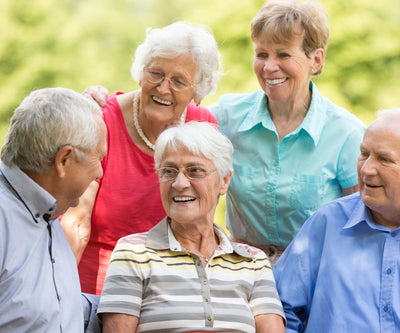 seniors group smiling dentures