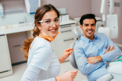 dentist with male patient