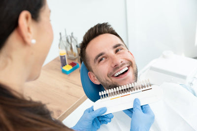 male having teeth whitening