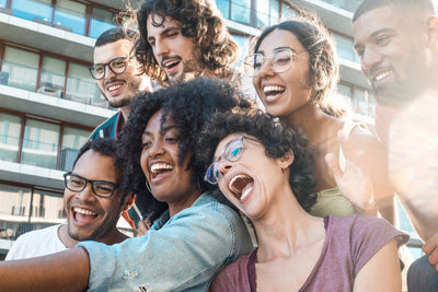 different races showing their white teeth